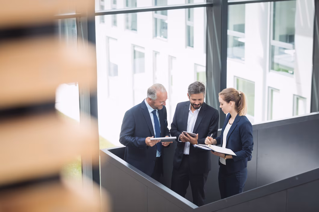 businesspeople-having-discussion-office_107420-84847